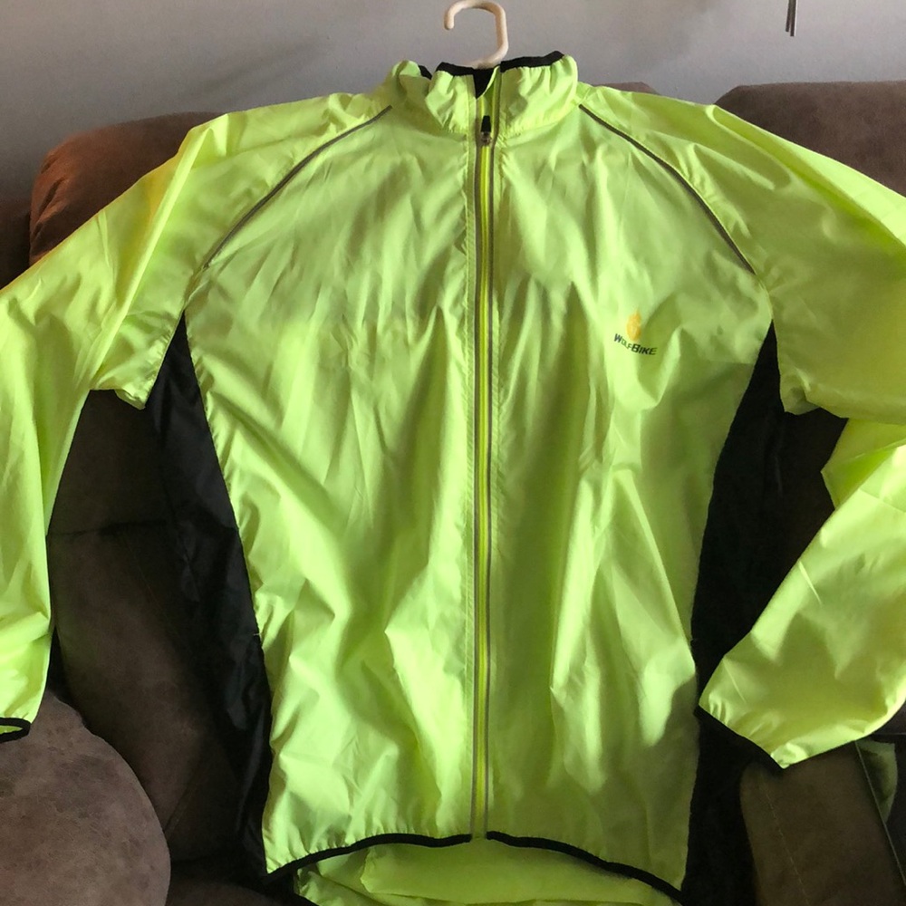 Wolfbike yellow windbreaker 2x runs 1 size small brand new nvr wore